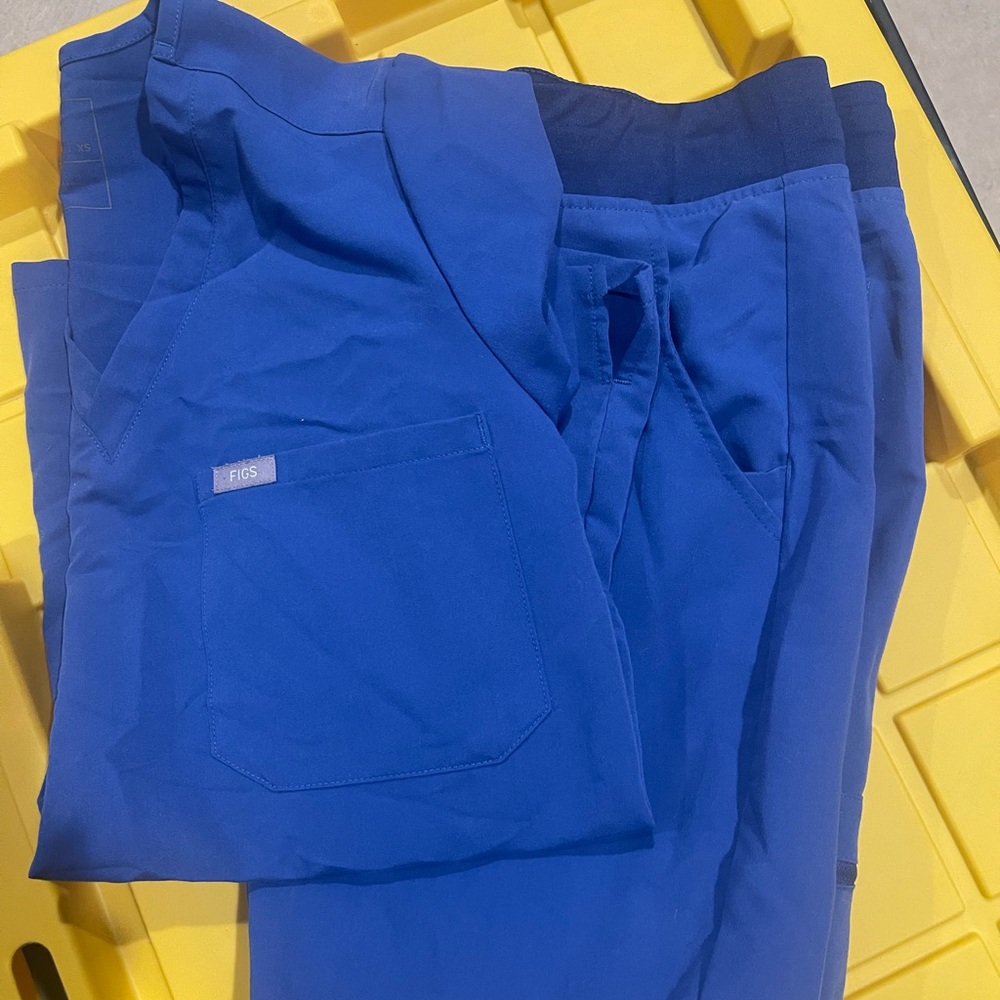 3 sets of figs scrubs